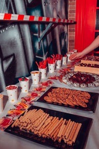 High angle view of woman having food on table