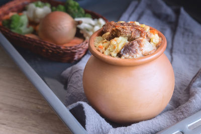 High angle view of bread in container on table