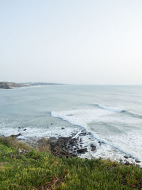 Scenic view of sea against clear sky