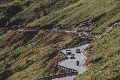 High angle view of road amidst mountains