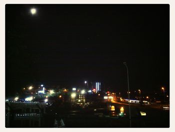 View of illuminated street light at night