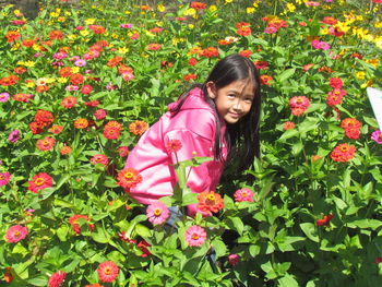 Smiling girl with flowers