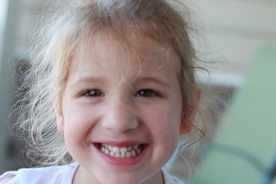 Close-up portrait of a smiling girl