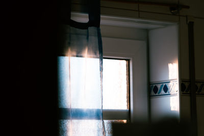 Sunlight streaming through window in building