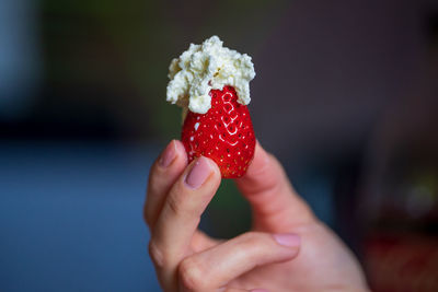 Midsection of person holding ice cream