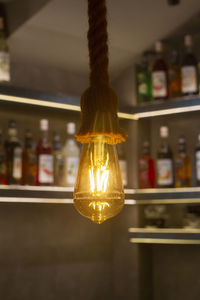 Close-up of illuminated light bulb