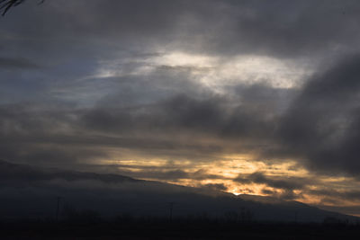 Scenic view of dramatic sky during sunset