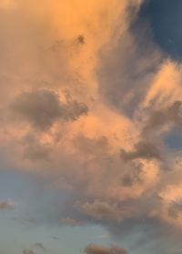 Low angle view of dramatic sky during sunset