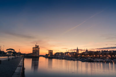 Panoramic view of the old harbor of la rochelle at blue hour with its famous old towers