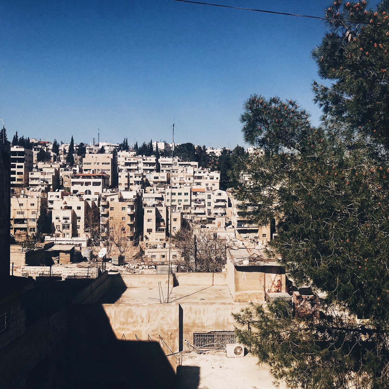 VIEW OF TOWNSCAPE AGAINST CLEAR SKY