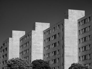 Low angle view of buildings against clear sky