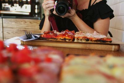 Close-up of woman holding food