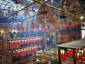 Row of illuminated lights in temple