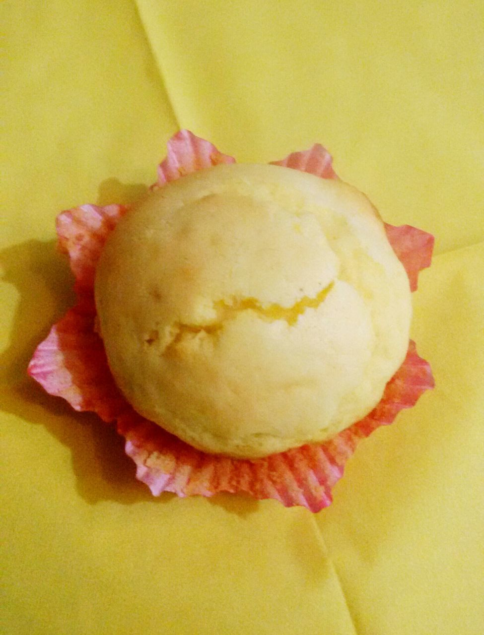 CLOSE-UP OF FRESH BREAD WITH YELLOW