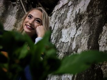 Portrait of a smiling young woman outdoors