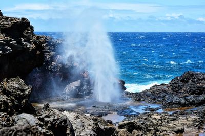 High angle view of geyser by sea