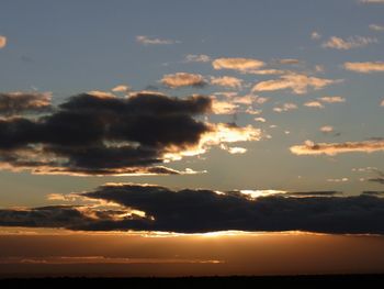 Low angle view of dramatic sky during sunset