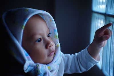  cute baby pointing while at home