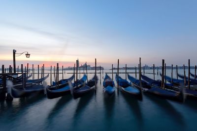 Gondolas in venice early in the morning in winter near st marks square