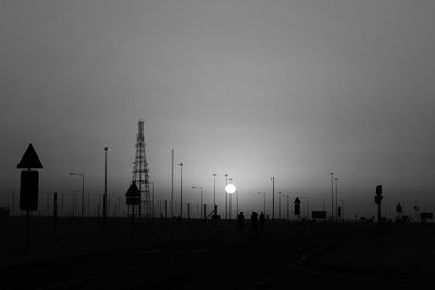 Silhouette of road against clear sky