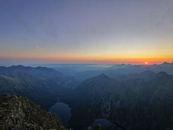 Scenic view of mountains against sky during sunset