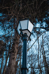 Low angle view of street light against sky