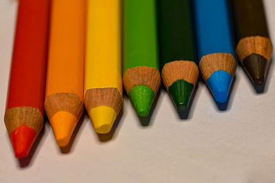 Close-up of colored pencils on table