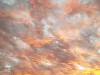 Low angle view of dramatic sky during sunset