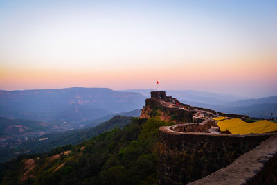 Scenic view of landscape against sky during sunset