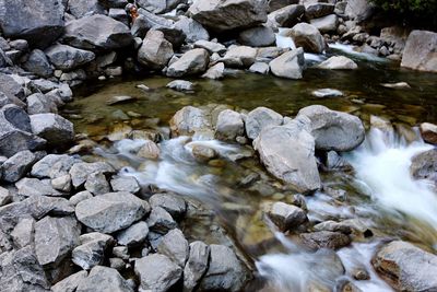 Stream flowing through rocks