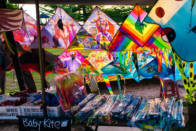 Colorful kites at market for sale