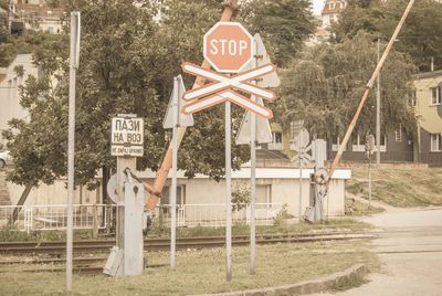 View of road sign against buildings