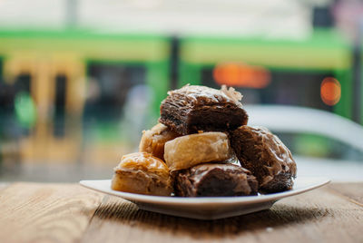 Close-up of bread in plate on table