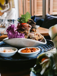 Close-up of food served on table