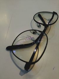 Close-up of eyeglasses on table