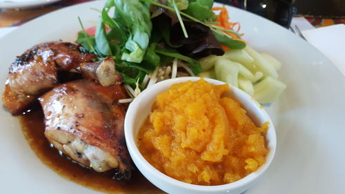 Close-up of served food in plate