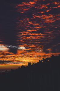 Scenic view of dramatic sky during sunset