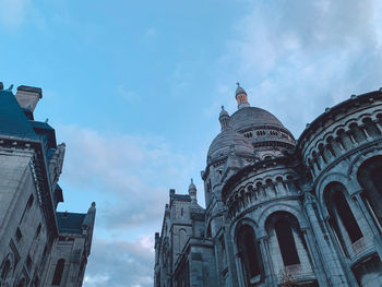 Low angle view of buildings against sky