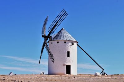 Traditional windmill in spain  with clear blue sky. stock photo copy space 