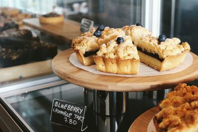 High angle view of blueberry tart in shop