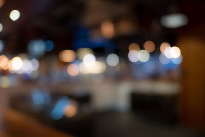 Defocused image of illuminated lights at night