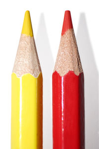 Close-up of red colored pencils