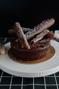 Close-up of chocolate cake in plate on table