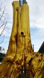 Low angle view of statue against sky