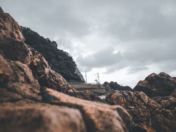 Rock formations on mountain against sky