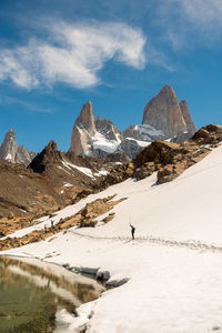 Panoramic view of snowcapped mountains against sky