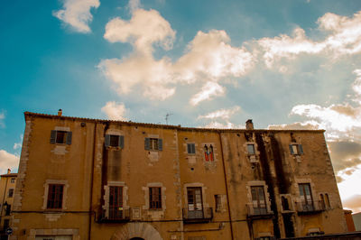 Low angle view of old building against sky