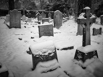 Snow covered cemetery