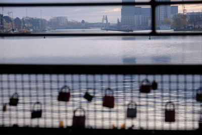 Close-up of river against buildings in city