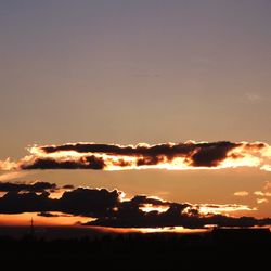 Scenic view of dramatic sky during sunset